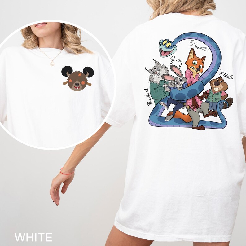 May include: White t-shirt with a cartoon design on the back featuring a blue snake and animal characters. The front has a small cartoon bear design. The word "WHITE" is at the bottom of the shirt.