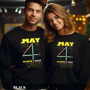 May include: A trio of ceramic mugs with a speckled, matte finish in cream, light grey, and dark grey. Each mug features a simple, minimalist design, ideal for tea or coffee.