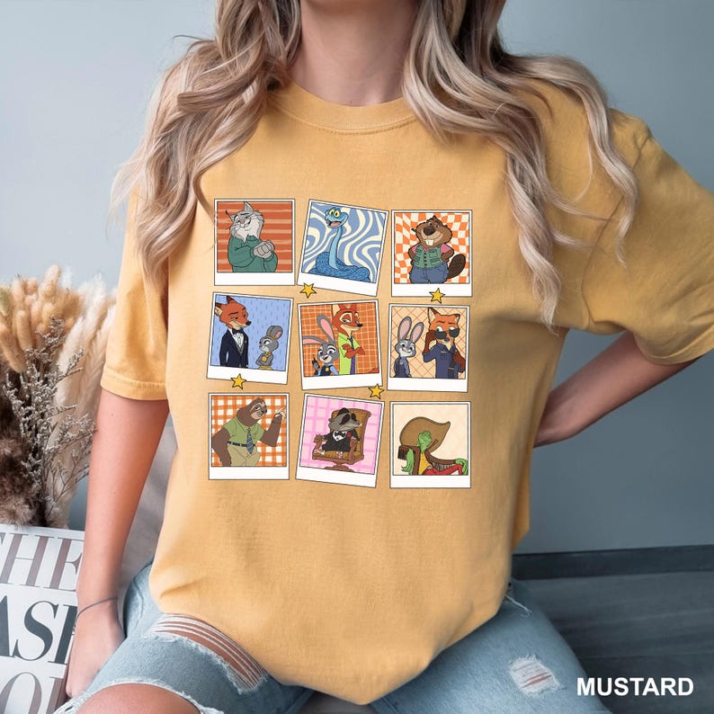 May include: Mustard-colored t-shirt featuring a grid of cartoon character portraits in a retro style. The portraits include various animal characters in different outfits and poses. The word "MUSTARD" is printed at the bottom right.