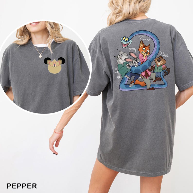 May include: A grey-green t-shirt with cartoon graphics. The front has a mouse character, and the back features a snake and cartoon characters. The names "Nick", "Judy", and "Nadia" are printed on the back. The word "Pepper" is at the bottom.
