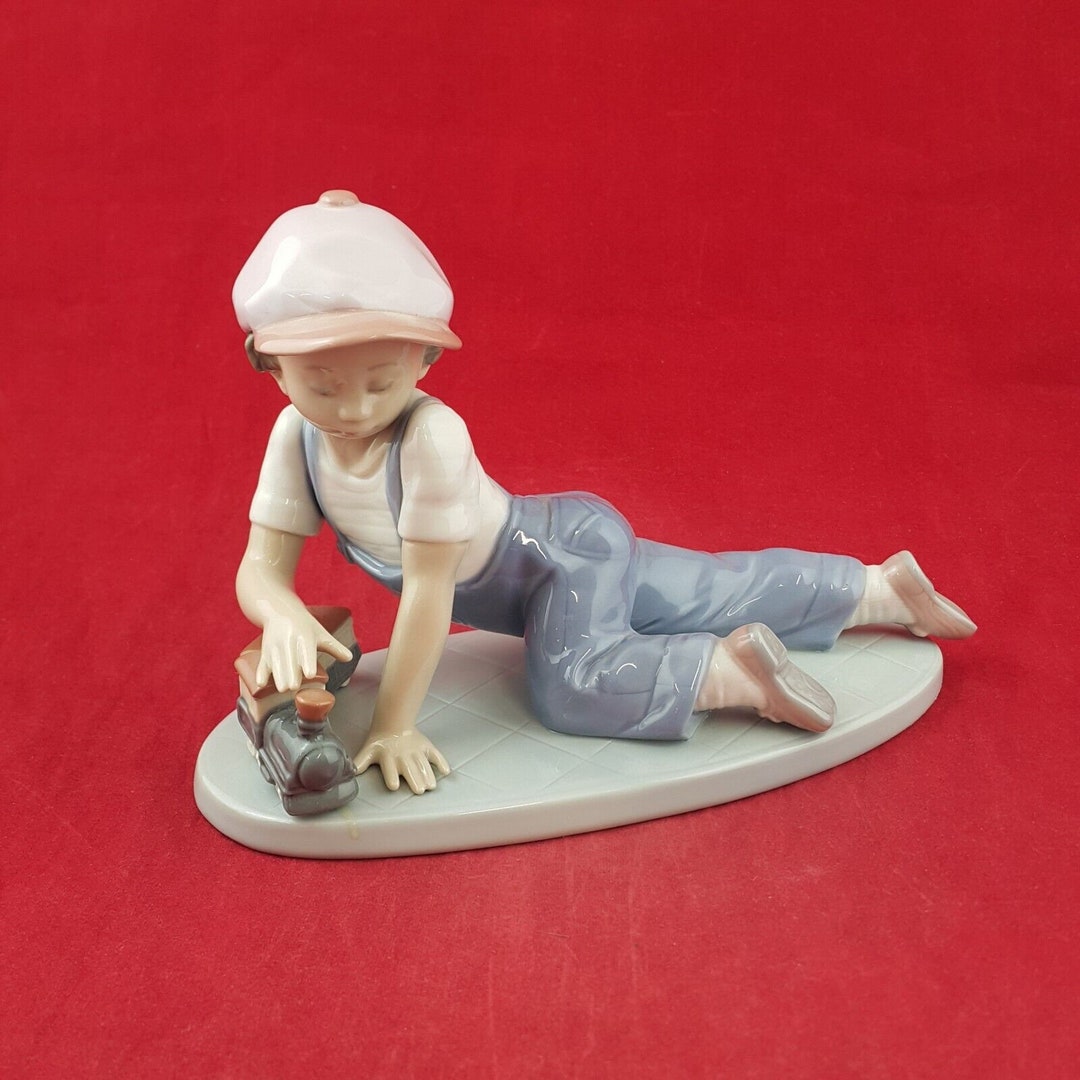 Lladro Figurine 7619 All Aboard Boy Playing With Train Etsy