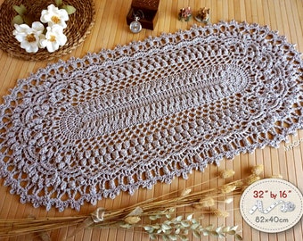 Light gray table runner hand crocheted with linen and cotton