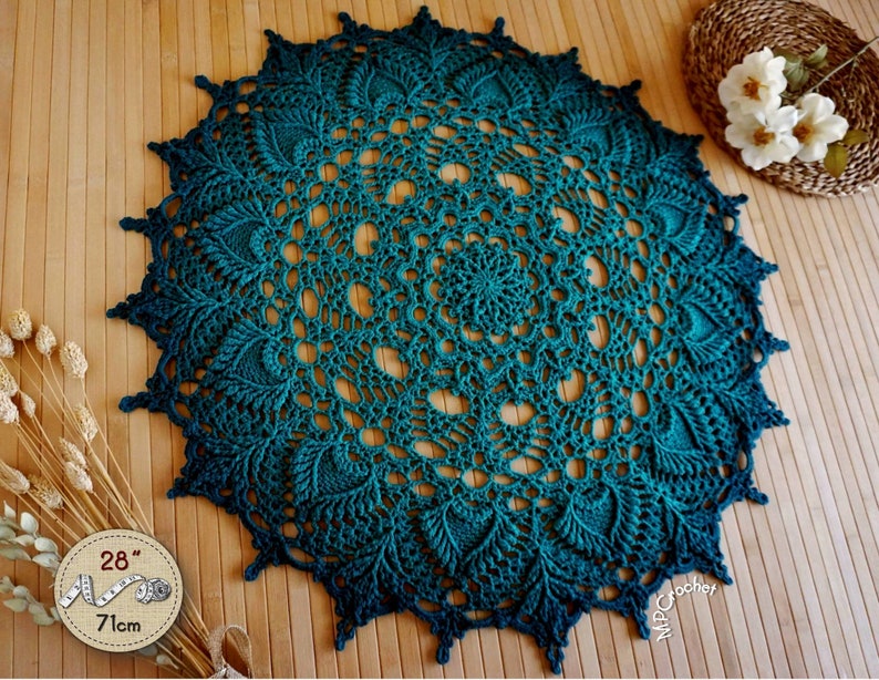 Large ombré teal green color doily. Bohemian style delicate turquoise green table topper hand crocheted with 12 beautiful petals in relief. Each petal ends in a fancy openwork and relief tip that forms a spectacular border, darker than the center.