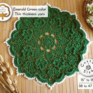 Green doily hand crocheted with thin thickness yarn, custom size 15 to 18 inches in bright emerald green edged with white little waves. Creative shamrocks in relief in a circle around the center of the piece.