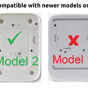 Puede incluir: Una b&aacute;scula digital blanca con una marca de verificaci&oacute;n en la parte inferior, etiquetada como "Modelo 2". Una segunda b&aacute;scula digital blanca con una X en la parte inferior, etiquetada como "Modelo 1". El texto "Compatible con modelos m&aacute;s nuevos solamente" est&aacute; en la parte superior de la imagen.