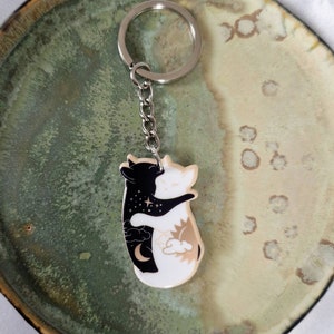 Acrylic key ring Black cat and white cat intertwined with sun and moon symbols Gift idea