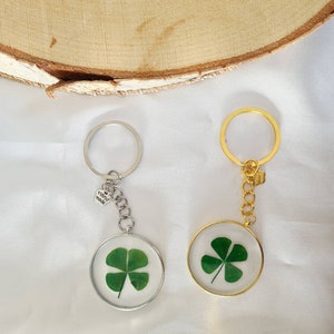 Handmade silver or gold key ring in resin metal and dried flower 4-leaf clover Handmade Gift idea