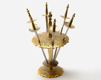 Six Toledo Cocktail Swords in a Stand