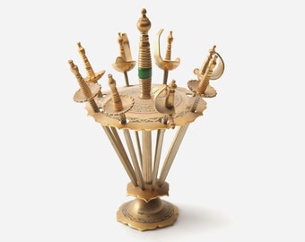 Eight Toledo Cocktail Swords in a Stand