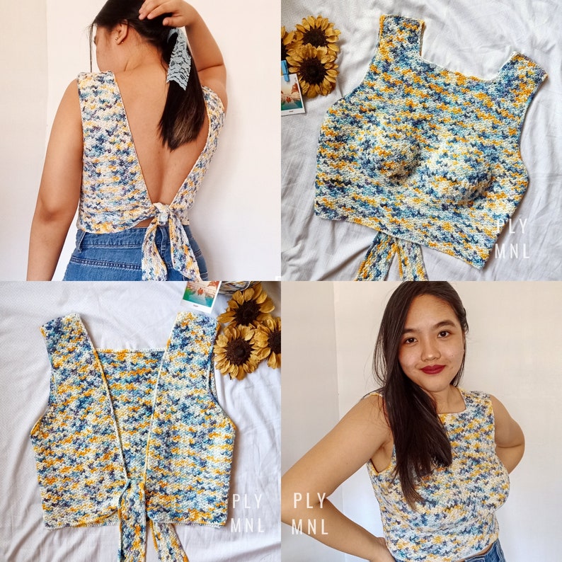 May include: A crocheted top with a tie back in a blue, yellow and white colour pattern. The top is shown on a model and laid flat.