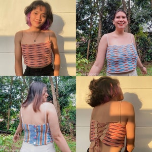 May include: Four different models wearing a crocheted top with a colorful geometric pattern. The top has a racerback style and is shown in three different color combinations: blue, orange, and brown; blue, white, and brown; and orange, white, and brown.