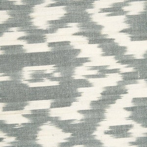 May include: Gray and white ikat fabric with a woven pattern.