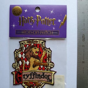 Warner Bros. Harry Potter Griffindor Patch  Sew On Patch, Vintage 2001, Still in Package, London England.  Perfect Condition.