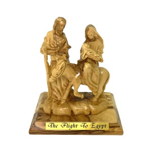 Flight to Egypt Joseph and Mary religious statue olive wood carving in Holy Land