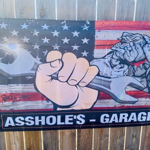 As**ole’s Garage Flag/Banner 100D Polyester  Brand new 36”x60”
