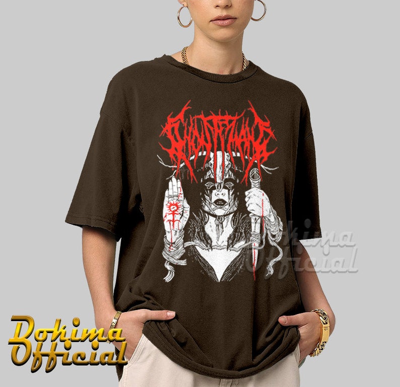 May include: A brown t-shirt with a white and red graphic print of a woman with a knife and the text "GHOST BATH" in red.