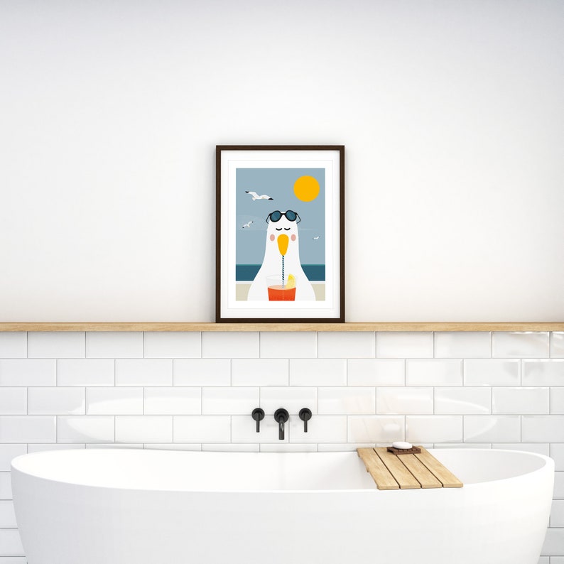May include: A framed illustration of a cartoon seagull wearing sunglasses and drinking a beverage with a straw. The seagull is sitting on a beach with a blue ocean and a yellow sun in the background.
