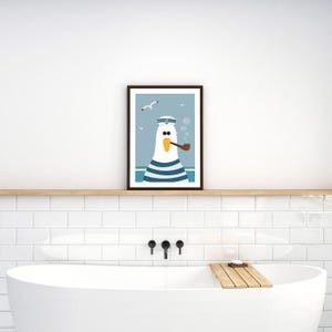 May include: A framed illustration of a cartoon seagull wearing a sailor hat and smoking a pipe. The seagull is blue and white striped and has a yellow beak. The background is blue with white seagulls flying in the sky.