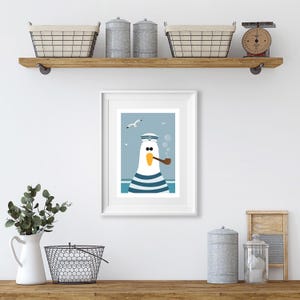 May include: A framed illustration of a cartoon seagull wearing a sailor hat and smoking a pipe. The seagull is white with blue and white stripes. The background is blue with white clouds and seagulls.