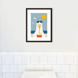 May include: A framed illustration of a cartoon seagull wearing sunglasses and drinking a beverage with a straw. The seagull is sitting on a beach with a blue ocean and a yellow sun in the background.