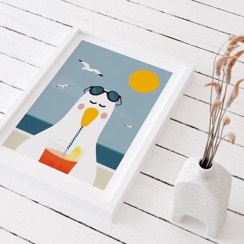 May include: A white seagull wearing sunglasses and a straw hat is drinking a glass of orange juice with a straw. The seagull is sitting on a beach with a blue sky and a yellow sun in the background.