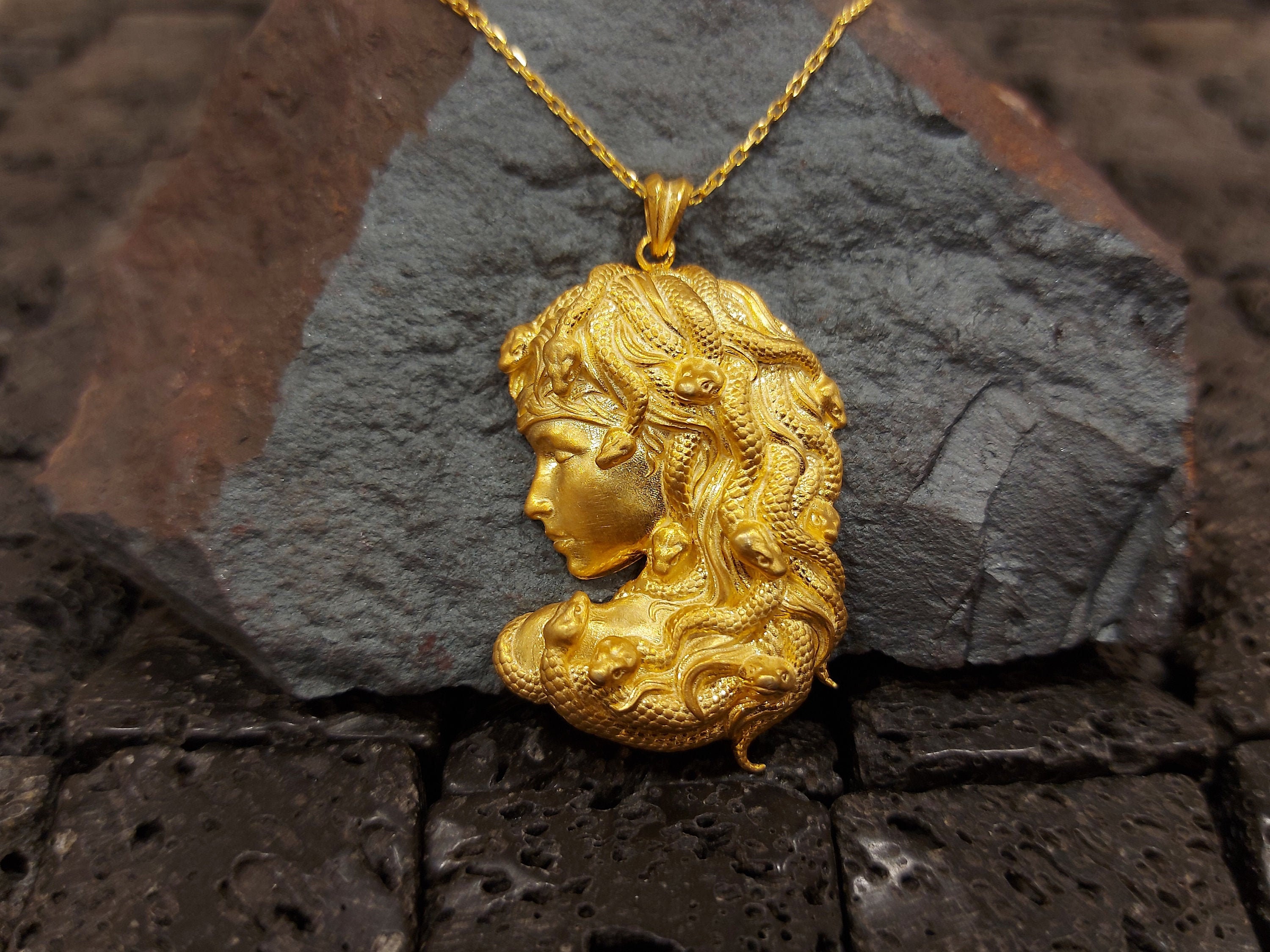 medusa necklace with tag