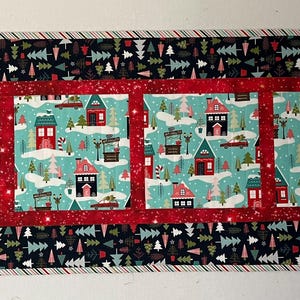 Camino de mesa acolchado con motivos navideños