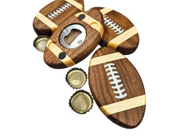 Bottle opener football shaped.  Can be customized for your favorite team.  Makes a great gift.  Made from solid Walnut.
