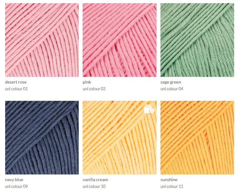 May include: Close-up of six skeins of yarn in various colors: desert rose, pink, sage green, navy blue, vanilla cream, and sunshine. Each skein is labeled with its color name and a uni color number.