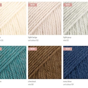 May include: A collection of six yarn skeins in various colors including off white, light beige, light gray, sea green, chestnut, and navy blue. Each square swatch features a NEW label and text identifying the color name and uni or mix code.