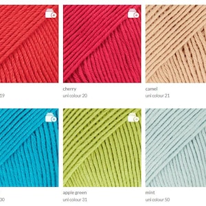 May include: Close-up of six skeins of yarn in various colors. Colors include red, cherry, camel, turquoise, apple green, and mint. Each skein is labeled with its color name and a uni color number.