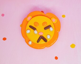 Broche del león llorón