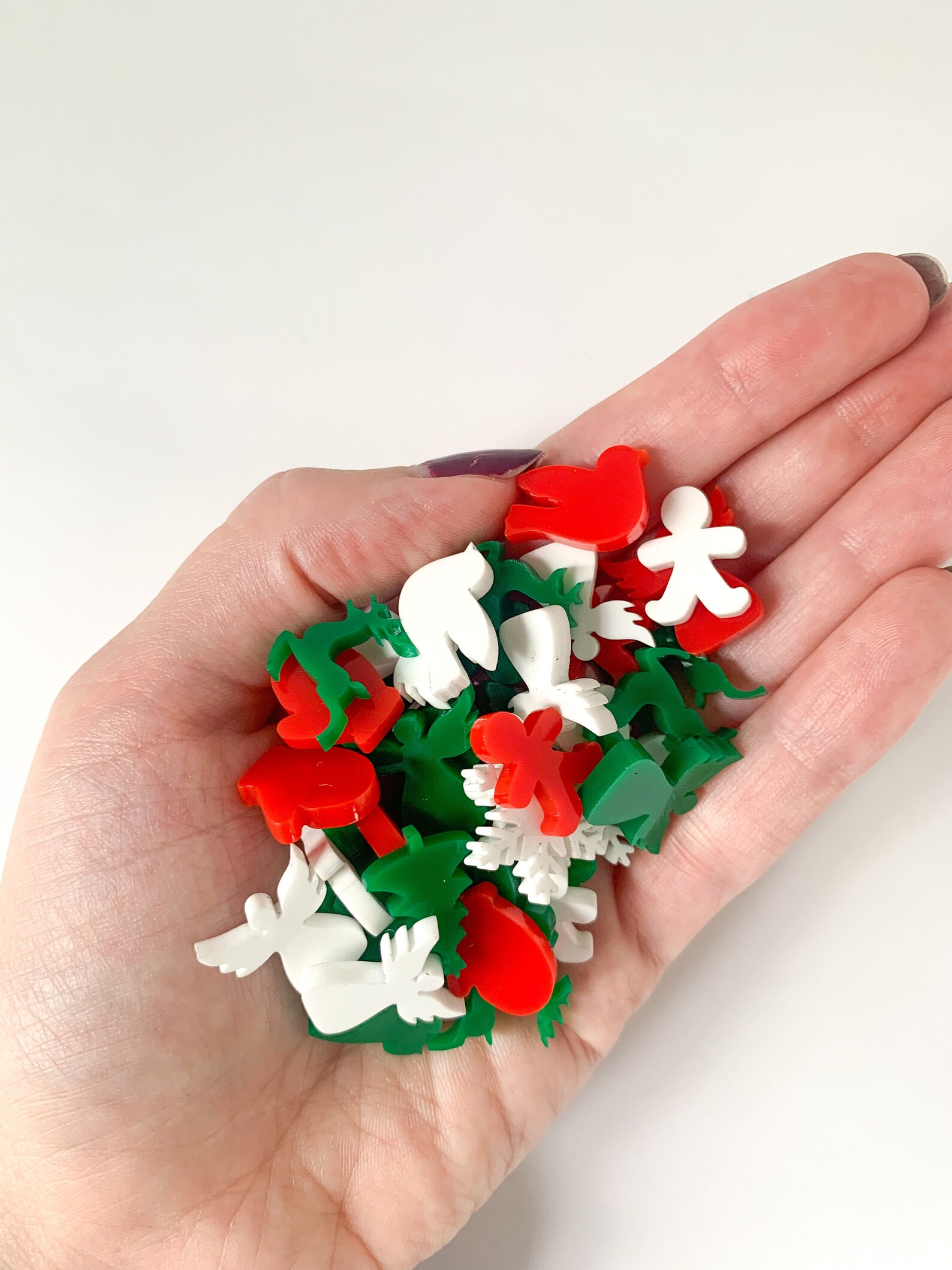 Red, green, and white Christmas acrylic confetti - Christmas party ideas - blog by Leah E. Moss Designs