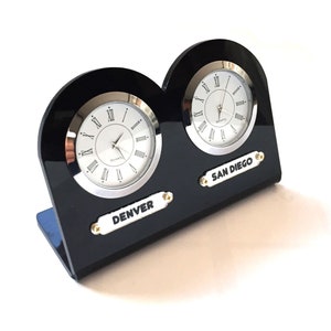 Black 5 mm acrylic 2-piece table clock. Names of two regions or cities. Customizable labels. Gold and silver watch option. Time zone clock