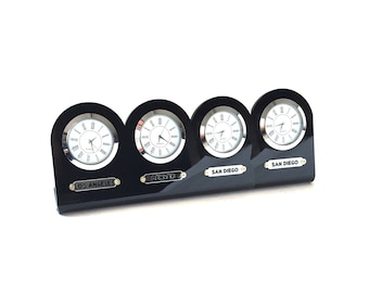 Black 5 mm acrylic 4-piece table clock. Names of three regions or cities. Customizable labels. Gold and silver watch option. Time zone clock
