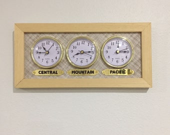 3 customizable zones. Time zone clock. optional zone labels. personal labels upon request. It is made of wooden frame.multi zone.