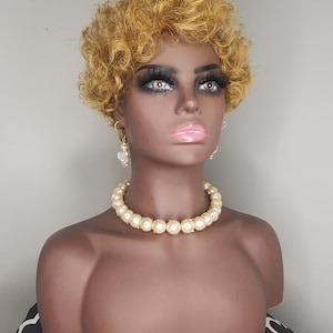 Short curly blonde wig full cap color 27