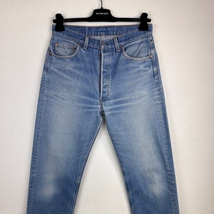 Levi's 501 jeans w31 L32 vintage 501s blue stonewash faded 90s Levis denim buttonfly straight leg USA 1993