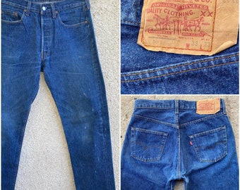 Levis 501 vintage W30 L30 bleu foncé brut début 80s