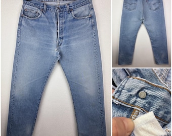 Levi's 501 vintage w32/33 L32 jeans azul lavado a la piedra años 80 pierna recta cierre de botones Levi's denim 555 Valencia Factory San Francisco USA