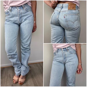 Levis 501 jeans w27 L34 vintage 501s light blue stonewash faded 90s Levi’s denim straight leg buttonfly USA 1995