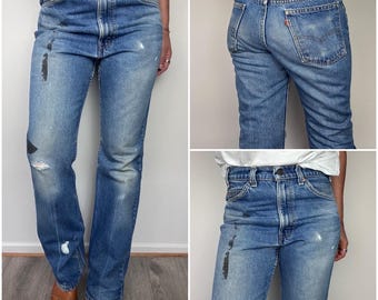 Levi’s 517 vintage w29/30 L32 jeans bleu moyen stonewash délavé fin 80s/début 90s orange tab bootcut Levis denim USA