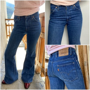 Vintage Levis 637-0217 w25 L33 flare orange tab 1970s bell bottom dark blue raw