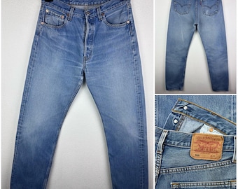 Levi's 501 vintage w31 L33 jeans, medium blue, stonewashed, straight leg, buttonfly, regular fit.