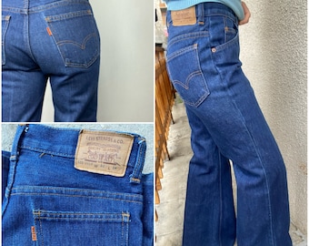 Vintage Levis 522-0917 w27 L31 flare orange tab 1970s bell bottom dark blue raw