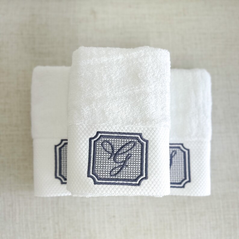 Elevate Your Bathroom Decor With an Embossed Twilight Monogrammed Hand