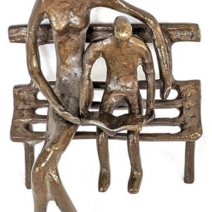 Folk Art Mother & Son Sculpture: Cast Iron Reading on Bench