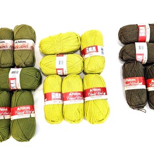 May include: A collection of yarn skeins in various colors, including olive green, bright yellow, and dark brown. The yarn is labeled "Patons Classic Wool Worsted". The skeins are arranged on a white surface.