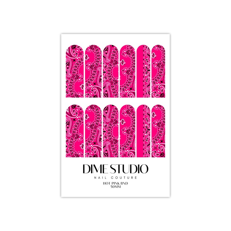 May include: A sheet of hot pink nail wraps with a paisley pattern. The wraps are designed for nail art and are from Dime Studio Nail Couture. The text "HOT PINK BND 50MM" is printed on the sheet.