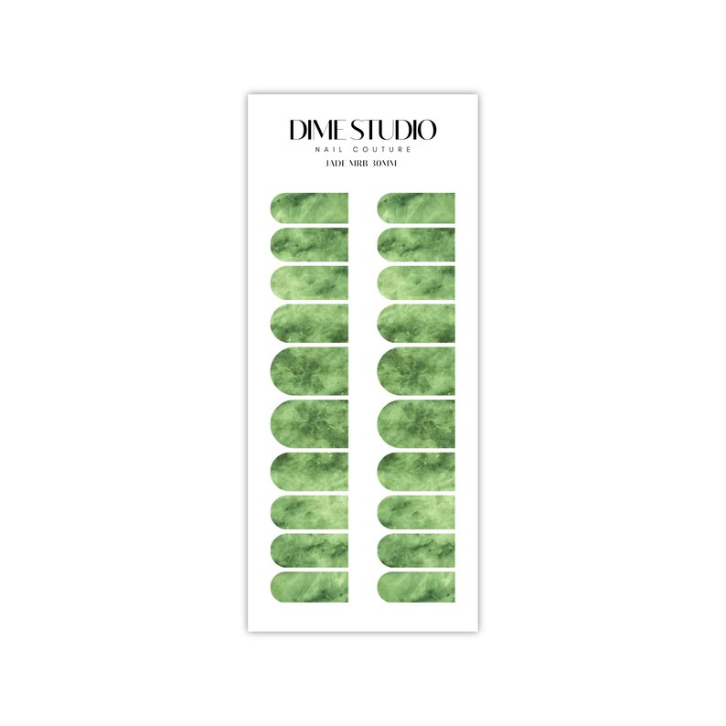 May include: A sheet of green marble-patterned nail wraps for a manicure. The nail wraps are designed for a full-coverage look and are arranged in two rows of ten. The sheet is labeled "DIME STUDIO NAIL COUTURE JADE NUDE 30MM".